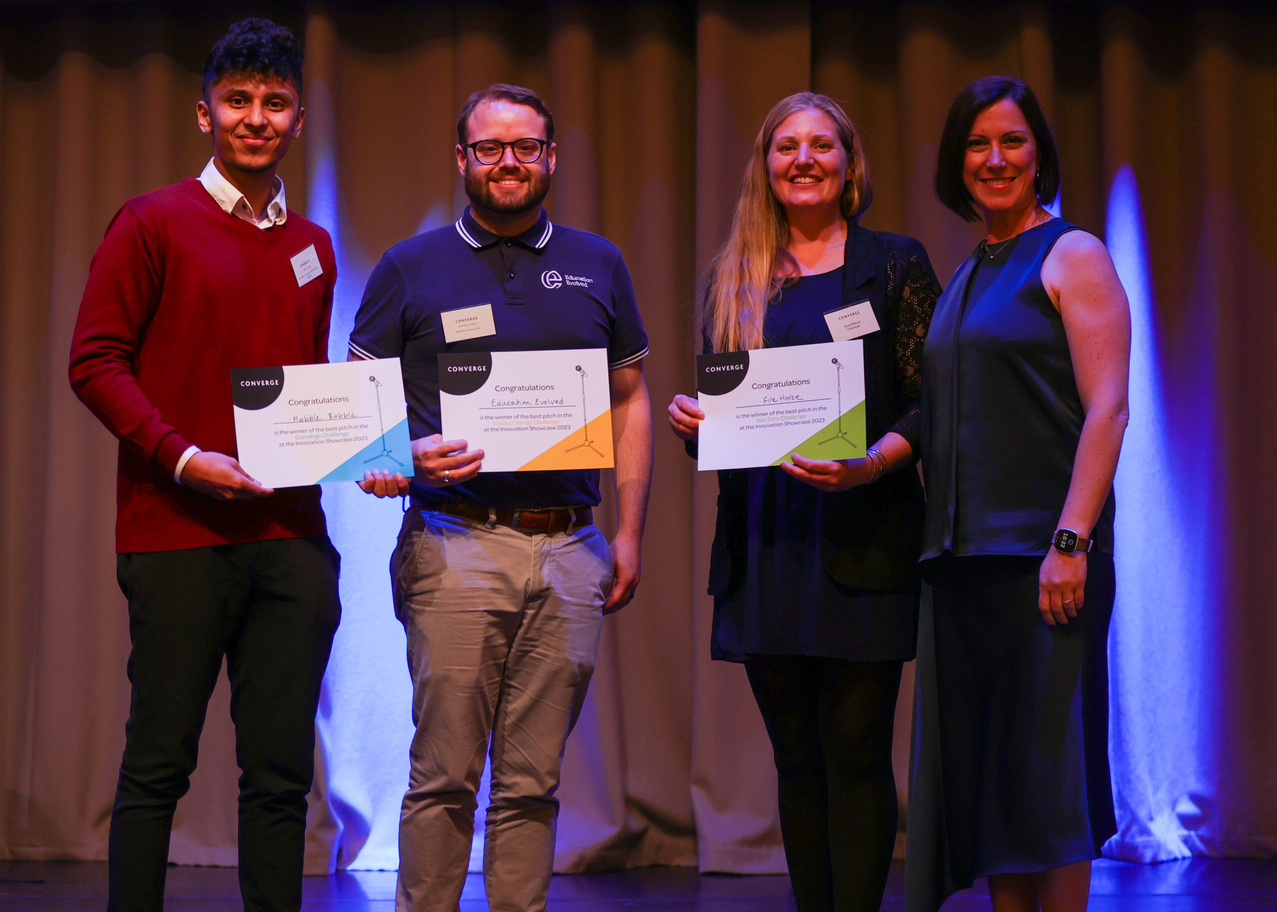 From Left to Right: Matthew Jevin from the University of Dundee with Hubble Bubble; Matthew Leeper from the University of Glasgow with Education Evolved; Anna Renouf from SRUC with FireHorse and Claudia Cavalluzzo, Executive Director of Converge